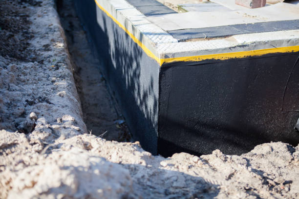 Professional Waterproofing technician working in Martinsburg, PA